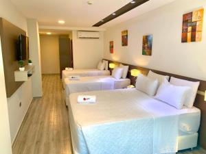 Телевізор і / або розважальний центр в Hotel Sun