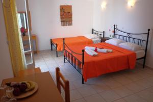 Posteľ alebo postele v izbe v ubytovaní Des Roses Hotel