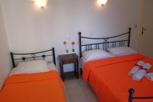 Posteľ alebo postele v izbe v ubytovaní Des Roses Hotel