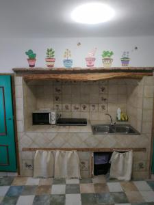 Kuchyňa alebo kuchynka v ubytovaní Apartamentos Fuente Nueva II