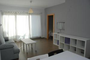 Homeincalpe Borumbot客房内的一张或多张床位