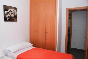 Cama ou camas em um quarto em Homeincalpe Borumbot