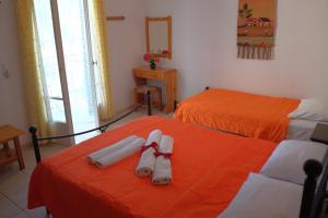Posteľ alebo postele v izbe v ubytovaní Des Roses Hotel
