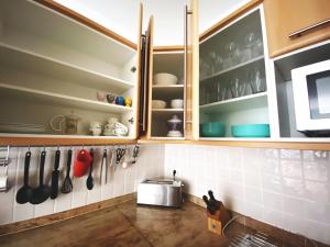 A kitchen or kitchenette at Penthouse 3 bedrooms, ocean view, near Siam Park