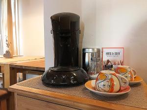 a black blender sitting on top of a counter at Holiday @ Bad Hindelang in Bad Hindelang
