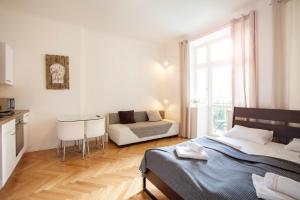 Postel nebo postele na pokoji v ubytování Friendly apartments in Prague