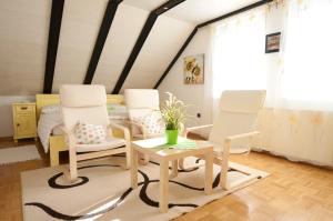 Posezení v ubytování Apartments Mencinger