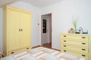 Postel nebo postele na pokoji v ubytování Apartments Mencinger