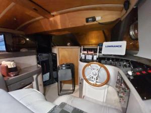 a view of an rv with a wooden steering wheel at Sleep Over Water in Lisbon in Lisbon