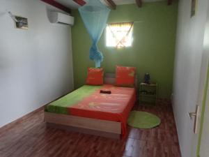 En eller flere senge i et værelse på La Casa Binecha avec Jacuzzi