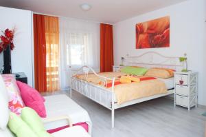 Postel nebo postele na pokoji v ubytování Apartments Mencinger