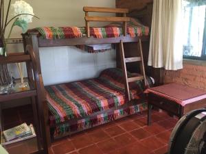 Кровать или кровати в номере Cabaña Campestre Las Palmas