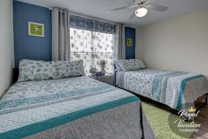 
A bed or beds in a room at Avalon at Clearwater Royal Marina
