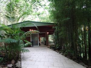 a walkway leading to a building with trees at Treetops Montville in Montville