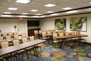 a classroom with tables and chairs in a room at Holiday Inn Express Hotel & Suites Cape Girardeau I-55 by IHG in Cape Girardeau