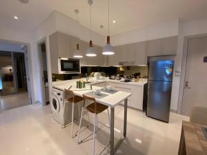 Dapur atau dapur kecil di Cassia Apartment 1