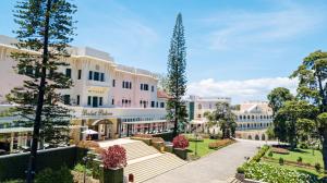 a rendering of the exterior of a building at Dalat Palace Heritage Hotel in Da Lat