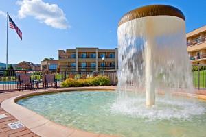 a fountain that is in front of a building at Holiday Inn Resort Lake George, an IHG Hotel in Lake George