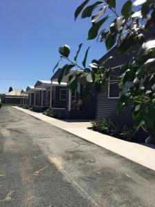 a row of houses on the side of a street at Terminus Hotel in Coonamble