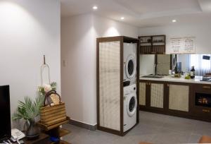 Dapur atau dapur kecil di Quang Vinh Apartment and Hotel Hoi An