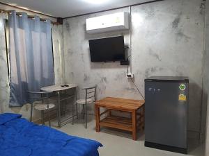 Kuchyň nebo kuchyňský kout v ubytování บ้านทะเลอิ่มเอม Bann Talay Im eimm
