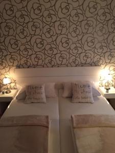 Voodi või voodid majutusasutuse B&B Alex18 toas