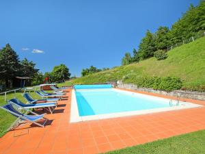 The swimming pool at or close to Apartment Piano Rosso 2 by Interhome