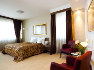 Lova arba lovos apgyvendinimo įstaigoje IN Hotel Beograd