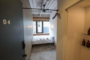 Postel nebo postele na pokoji v ubytování mizuka Imaizumi 1 - unmanned hotel - + 24 fotografií