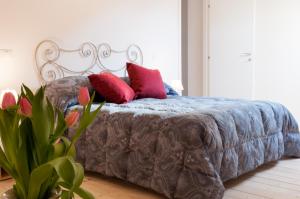 Ein Bett oder Betten in einem Zimmer der Unterkunft Quiet Home Terracina Apartments