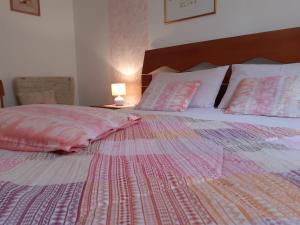 Posteľ alebo postele v izbe v ubytovaní Saglia Apartments