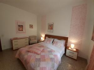 Posteľ alebo postele v izbe v ubytovaní Saglia Apartments