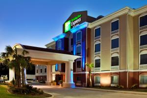 a hotel with a sign on the front of it at Holiday Inn Express Amite, an IHG Hotel in Amite