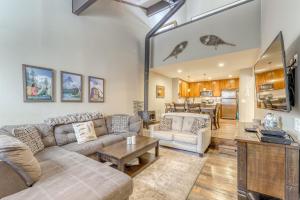 a living room with a couch and a table at St. Moritz 13 in Mammoth Lakes