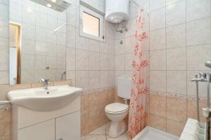 Koupelna v ubytování Apartments Edin 1359