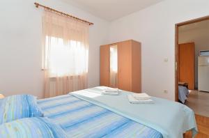 Postel nebo postele na pokoji v ubytování Apartments Edin 1359 + 37 fotografií