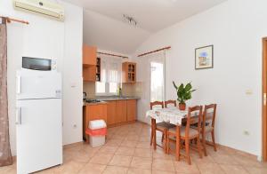 Kuchyň nebo kuchyňský kout v ubytování Apartments Edin 1359