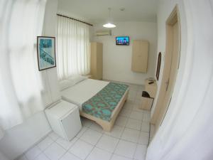 Postel nebo postele na pokoji v ubytování Kleopatra Carina Hotel