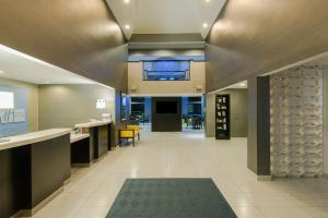 a lobby of a hospital with a large window at Holiday Inn Express & Suites Cooperstown by IHG in Cooperstown