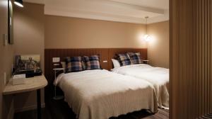 Postel nebo postele na pokoji v ubytování miss morgan hotel