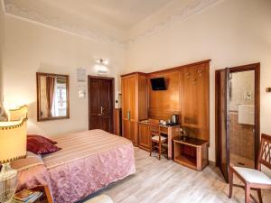 Voodi või voodid majutusasutuse Hotel Labelle toas