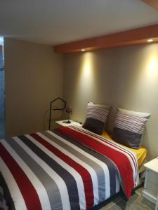 Ένα ή περισσότερα κρεβάτια σε δωμάτιο στο La KLEMALINE