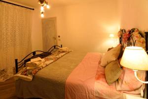 A bed or beds in a room at Il Borgo del Castello