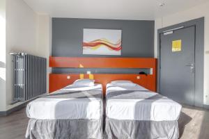 Postel nebo postele na pokoji v ubytování Hotel Esplanade