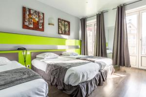 Postel nebo postele na pokoji v ubytování Hotel Esplanade