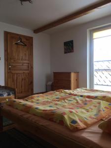 A bed or beds in a room at Agro privat