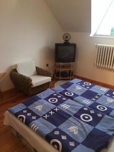 A bed or beds in a room at Agro privat