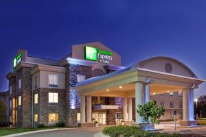 a hotel with a sign on top of a building at Holiday Inn Express & Suites East Wichita I-35 Andover, an IHG Hotel in Andover