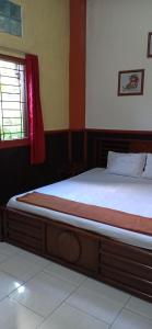Letto o letti in una camera di ADA Homestay