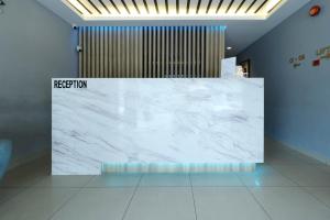 a large white marble counter in a room at Suite Dreamz Hotel in Kuala Lumpur